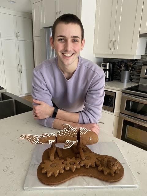 Young baker has cake decorating moving in different directions!