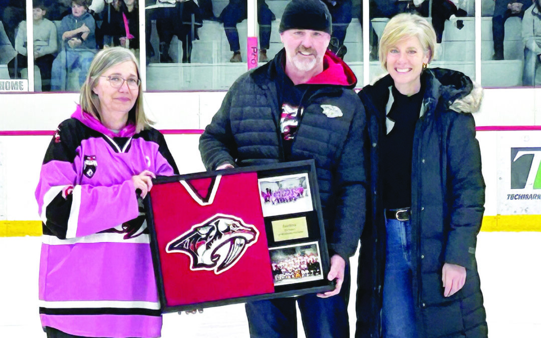 A fitting tribute to Coach Forbes at centre ice